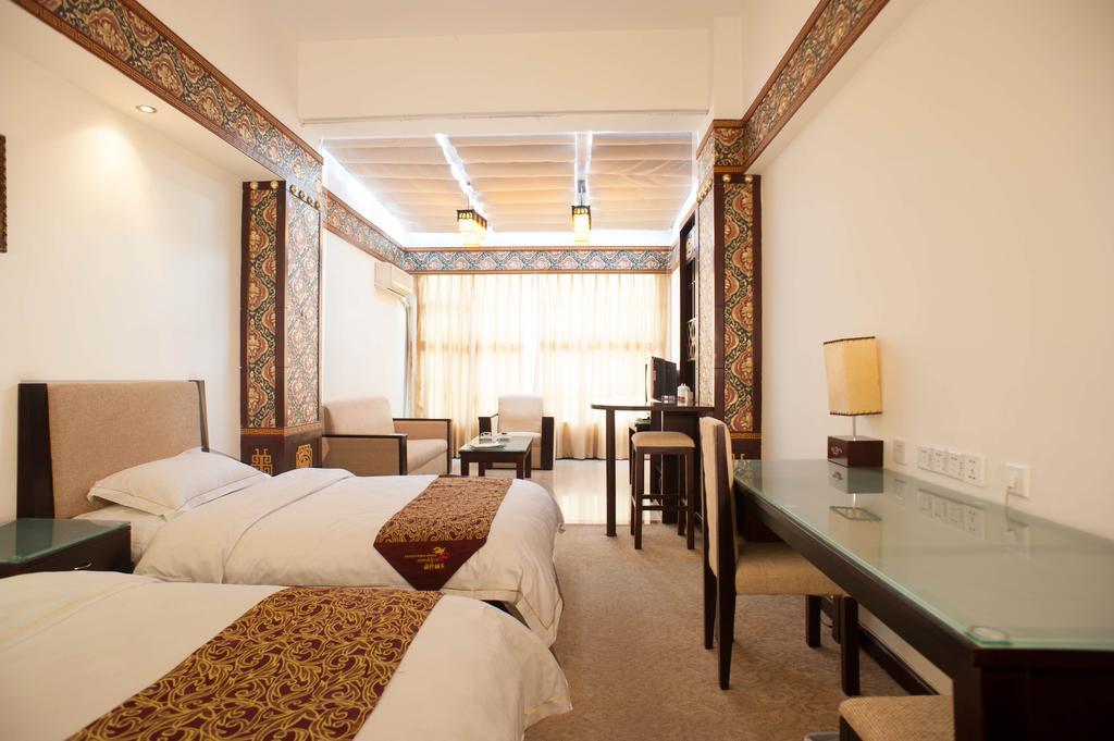 Jiuzhaigou Jinzhulinka Resort Hotel جيوتشايقو الغرفة الصورة